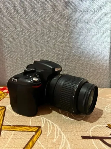 Câmera Nikon D5100 - Com bateria e cartão