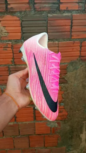 CHUTEIRA NIKE TRAVA MISTA