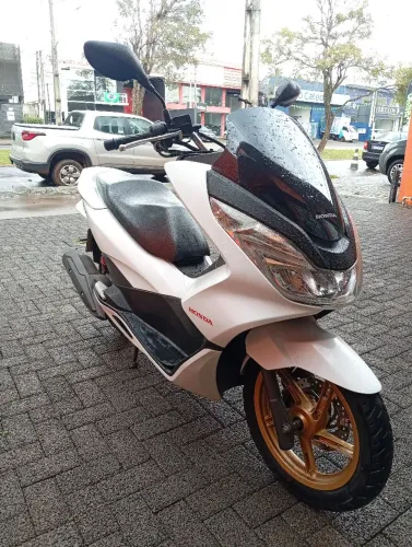 Em esselente estado de conservação  moto muito nova