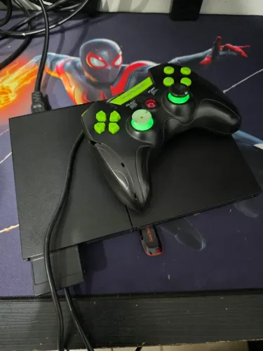PlayStation 2 slim + Pendrive 64 gigas