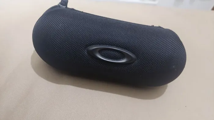 Porta óculos da oakley original duro perfeita