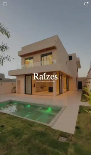 Casa em condomínio fechado com 4 suítes e lazer completo, em Uberlândia