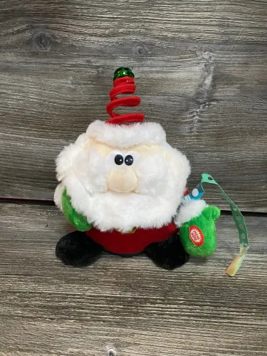pelúcia papai noel eletrônico 