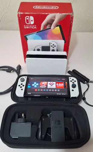 Nintendo Switch OLED desbloqueado com central de jogos + caixa + case + nota