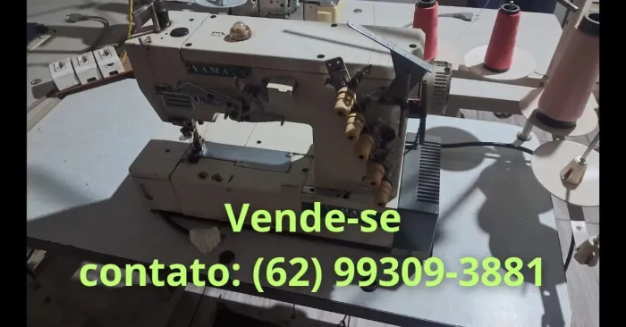 Máquina overloque Singer 