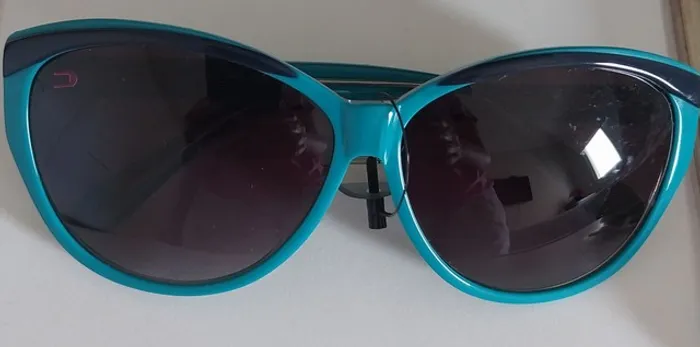 Oculos de sol Triton