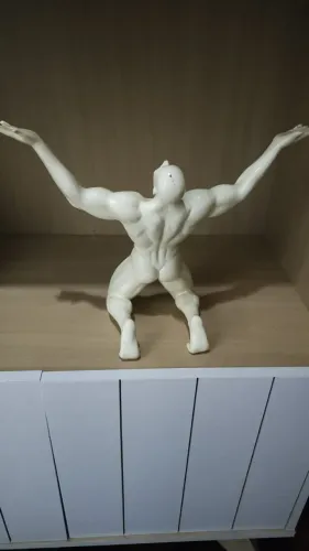 Estátua Porcelana Homem Nu Corpo Atlético Tam: 32cm Larg x 27cm Altura