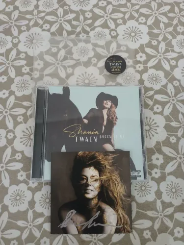 Cd Shania Twain com card autografado.