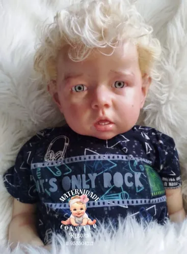 Bebê Reborn 73 cm cabelo fio a fio olhos importado 