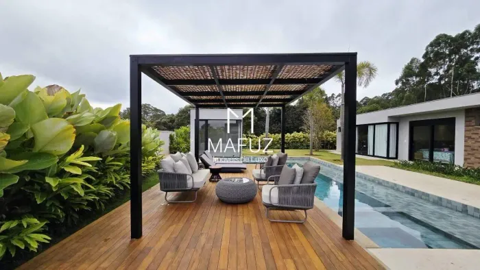 CASA TÉRREA COM 5 SUÍTES, GOURMET COMPLETO E LAZER COM PISCINA E SAUNA