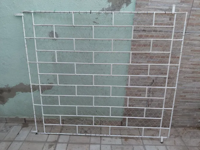 Grades de janela e porta de ferro