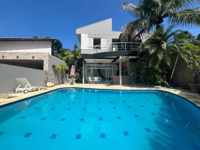 Casa de 403m² com 4 suítes, piscina e espaço gourment em Riviera Bertioga - SP