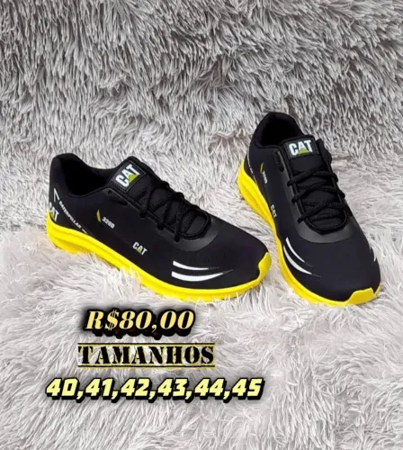 Tênis caterpillar preto com amarelo