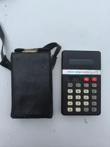 Colecionadores, calculadora eletrônica antiga(leia a descrição)