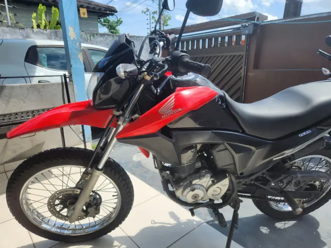 Honda bros , em ótimo estado pneus bons ,kit de transmissão  