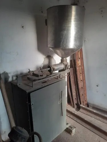 Máquina dosadora de mel