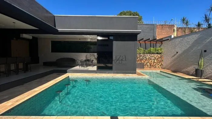 Casa para vender ou alugar com 4 suítes, espaço gourmet e piscina em condomínio fechado