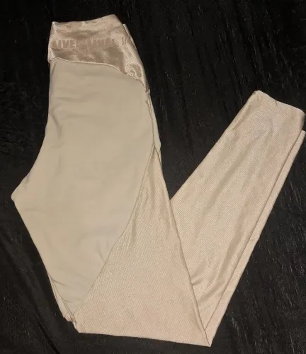 Calça leg live dourada