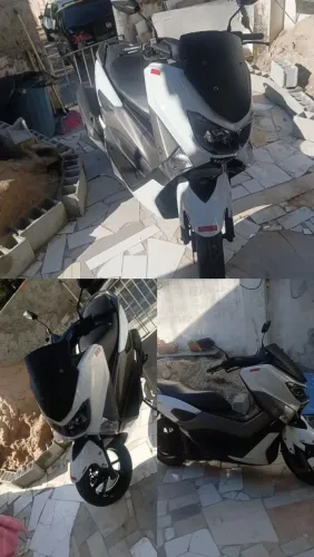Moto linda apenas marcas de uso