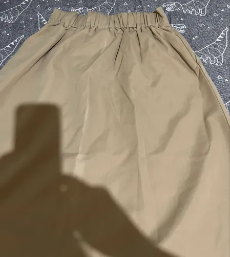 Saia seminova na cor Marrom, tamanho P, marca: Lovito.