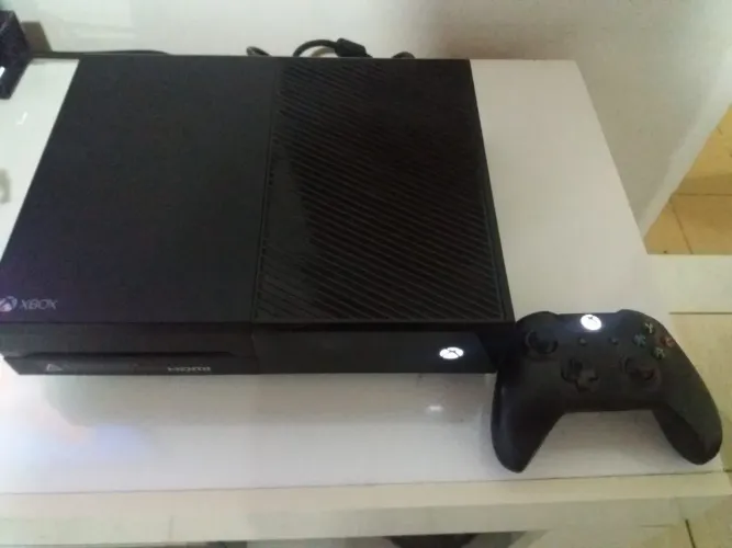 Vídeo game 100% nenhum defeito, fonte e controle originais, muitos jogos(12físicos e 40 dg
