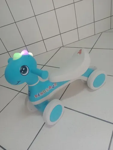 Motoquinha Dinossauro músical
