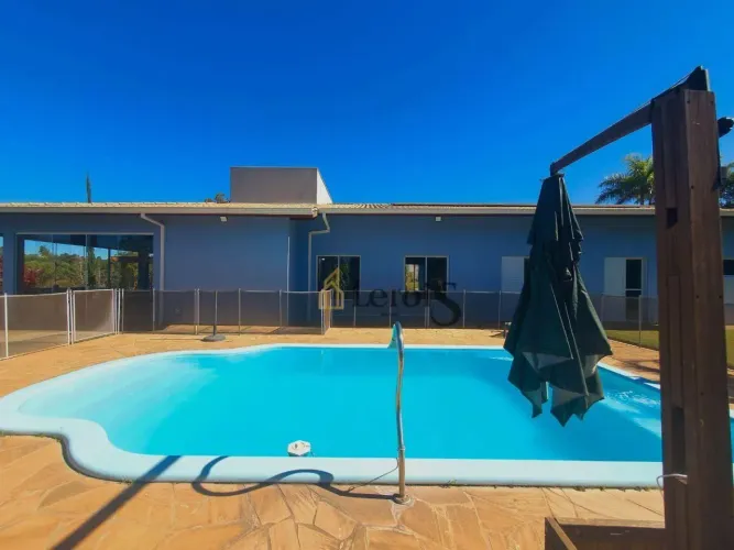 Casa com 4 dormitórios à venda, 244 m² por R$ 1.550.000,00 - Condomínio Terras Di Leonardi