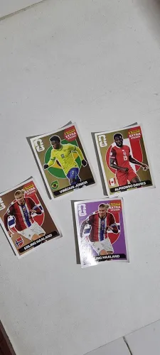 Figurinha Legend Ouro Vini Jr, Ouro Alphonso, Bronze e Roxa de Haaland