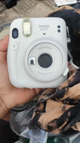 Câmera Polaroid Instax Fotos na Hora Pra vender Logo