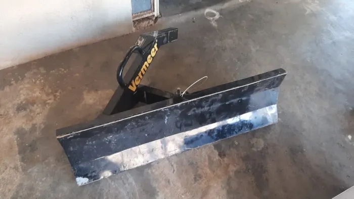 Lamina com braço da Bob cat