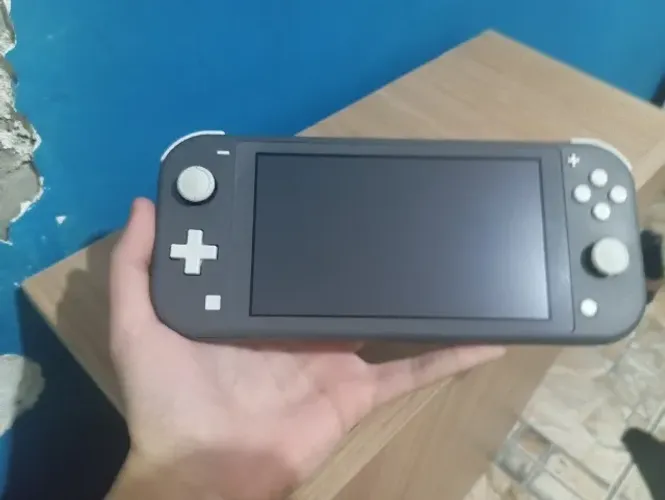 Nintendo switch lite cinza desbloqueado 128g semi-novo.