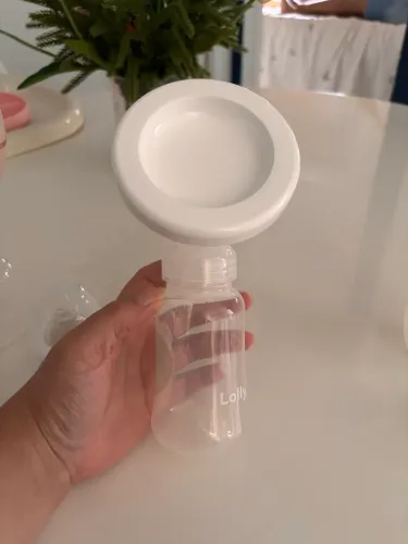 Coletor e extratora de leite manual