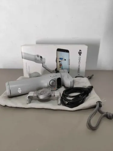 Estabilizador de celular gimbal DJI osmo mobile 7 cor cinza - USADO