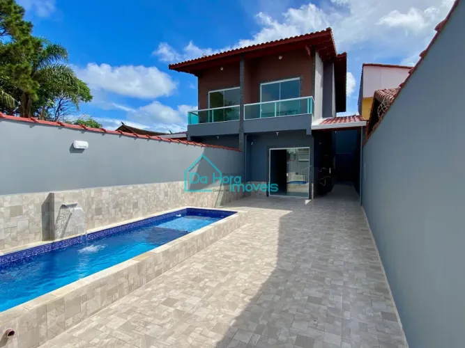sobrado com piscina lado praia com ótimo acabamento a venda em mongaguá