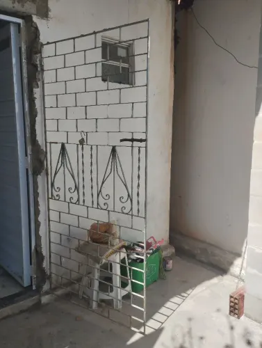 Grade para porta medindo 2,10x 0,80