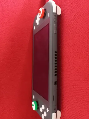 Vendo nintendo switch lite sem carregador nunca caiu e nem aberto tá novo trocar por TV 43