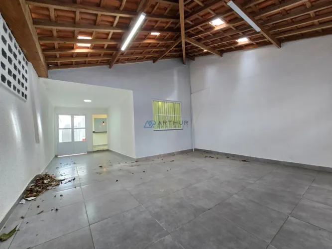 Casa Geminada à Venda em Praia Grande à menos de 100 metros do mar com 3 suítes