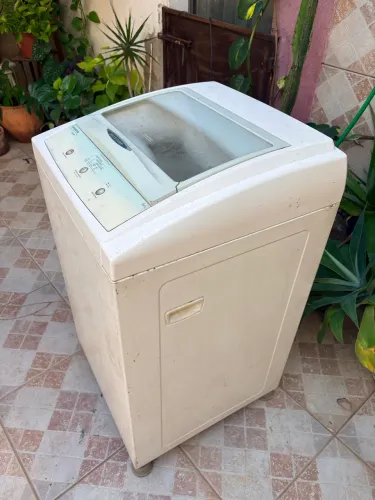 Máquina de lavar com defeito 