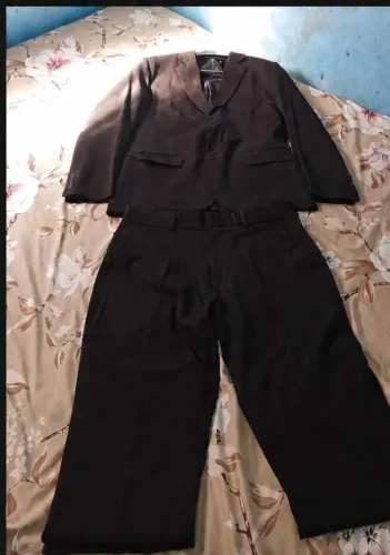 Terno preto semi novo