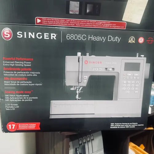 Máquinas de costura Singer heavy duty e Ultralock pro