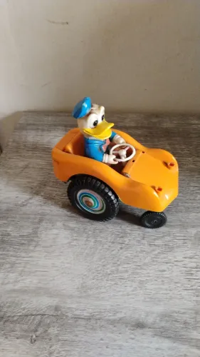 Antigo brinquedo infantil Buggymovel carrinho pato Donald anos 70/80