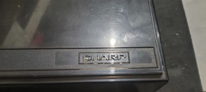Tampa acrílico Sharp SG165