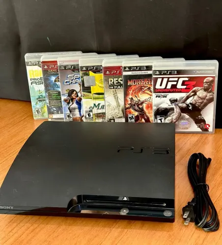 Vendo PS3 SLIM c/8 Jogos
