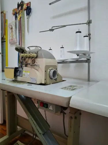 Maquina Overlock Singer