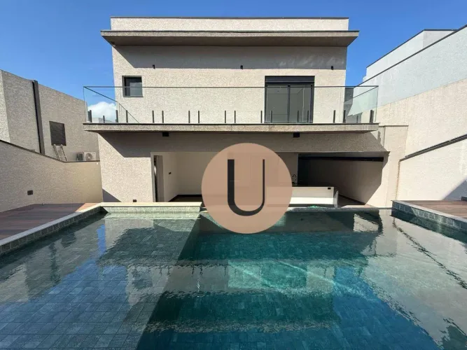 Casa em Condomínio em Atibaia: 4 Suítes, Piscina borda Infinita e Lareira
