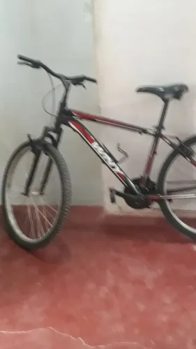 Vendo ou troco  bicicleta de alumínio aro 26 em galinhas de capoeira fêmeas 