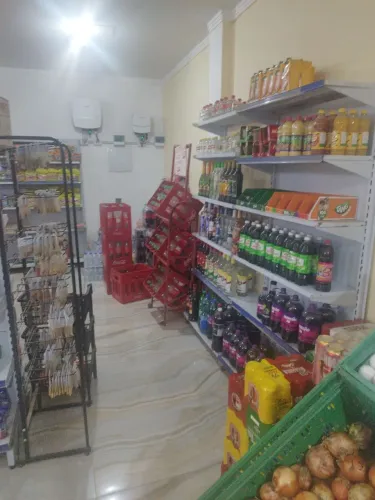 Vendo mercado com 2 apartamentos