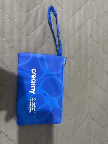 Necessaire Creamy azul e necessaire roxa