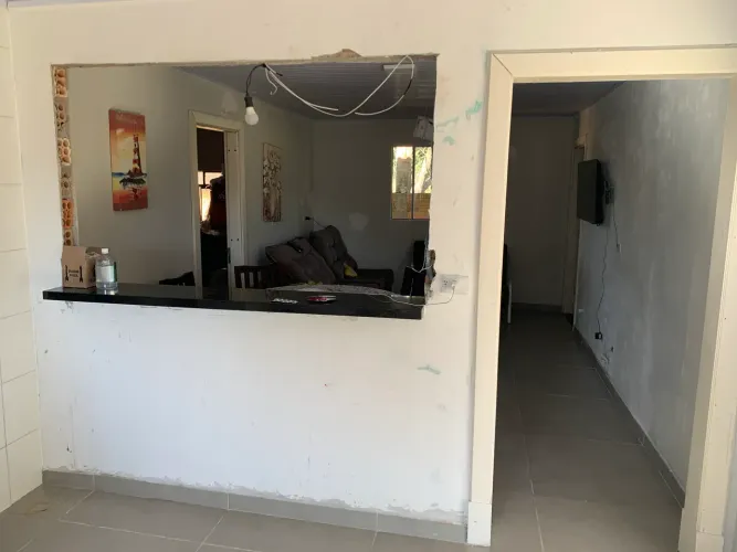 OPORTUNIDADE! CASA COM AMPLO TERRENO DE 480m² EM REGIÃO TRANQUILA E FAMILIAR