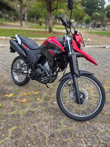 SERRÊ E LÉO MOTOS LANDER 24 MUITO NOVA